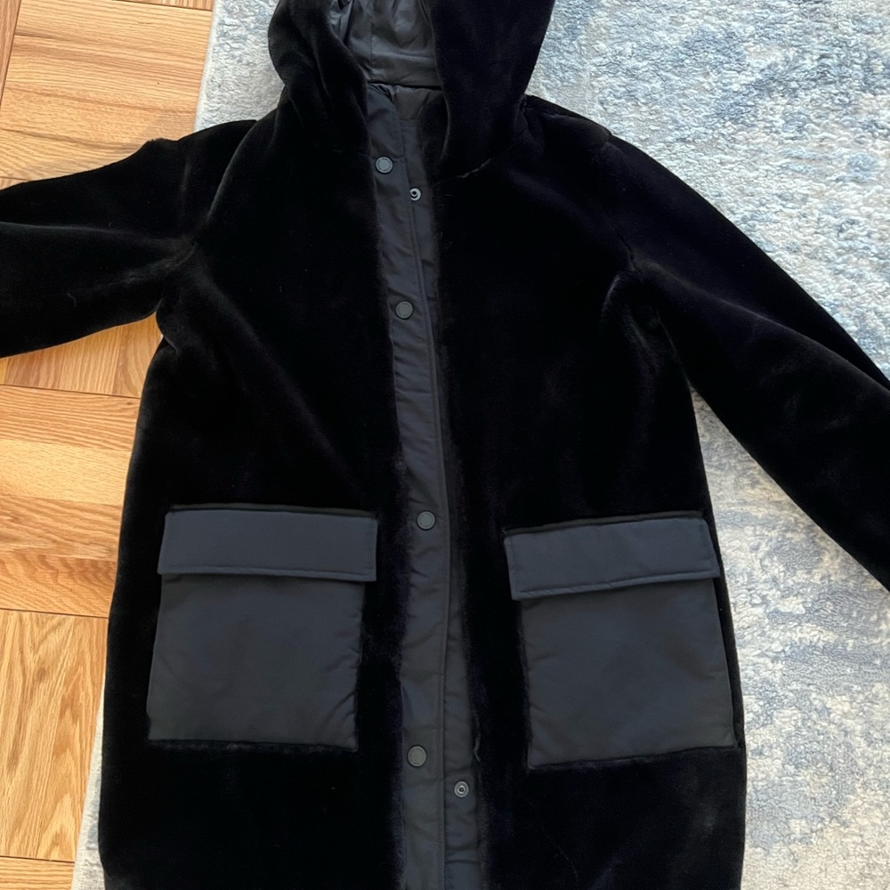 Fur jacket with inside out to rain jacket!